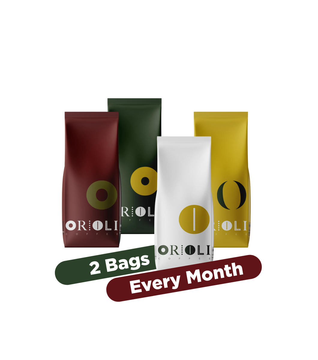 Four coffee bags with 'ORIOLI' branding and promotional text on a white background