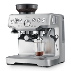 Sage espresso machine with a glass of coffee on a white background