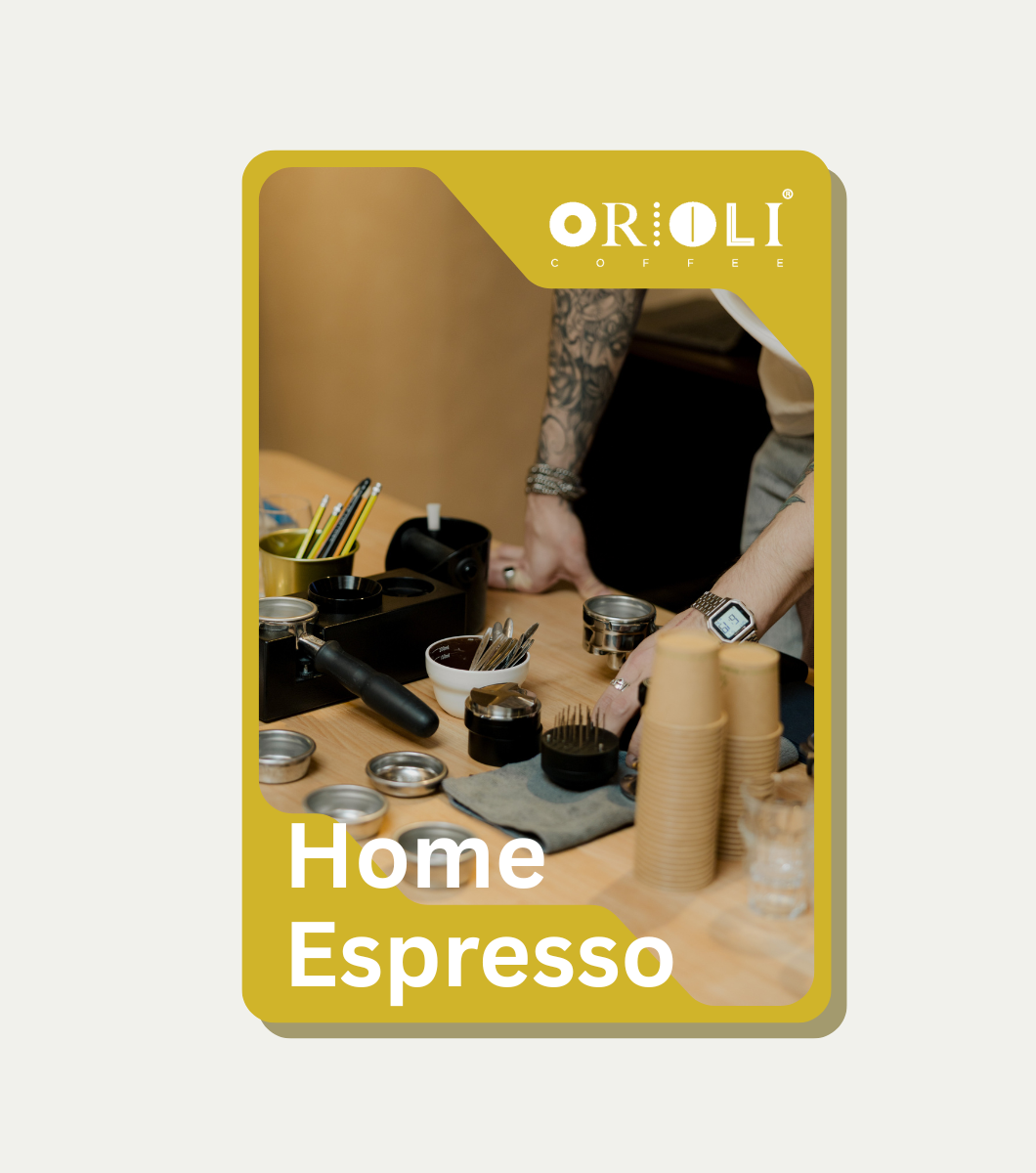 Orioli Home Espresso product packaging with a person preparing coffee.